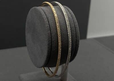 goud en zilveren armband